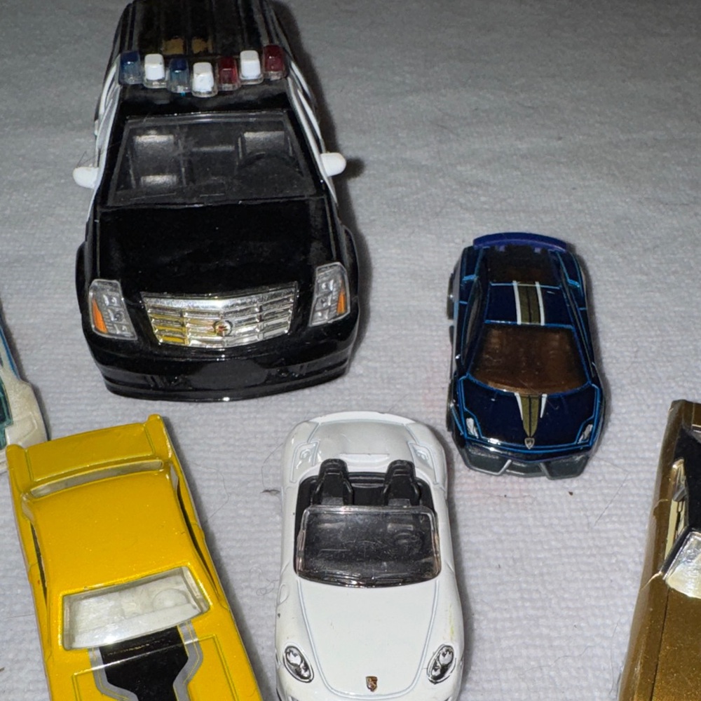 Die-Cast Toy Car Collection with Black, White, and Gold Vehicles - Picture 3 of 5